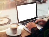 working on laptop in a coffee shop